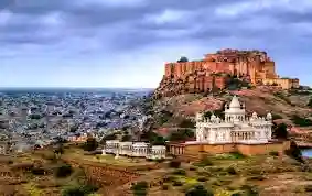 Mehrangarh Fort on a hilltop above Jodhpur with the white marble Jaswant Thada cenotaph below